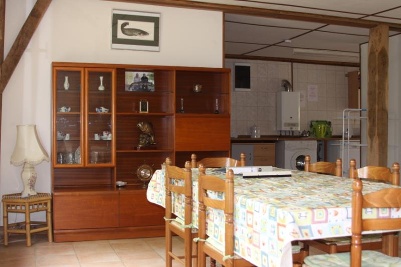Dining area towards galley kitchen - Fishing Holiday in France